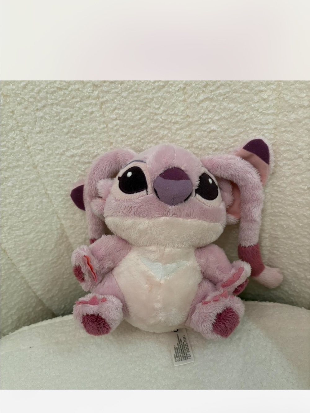 Disney Pink Plush Character with White Tag Detail